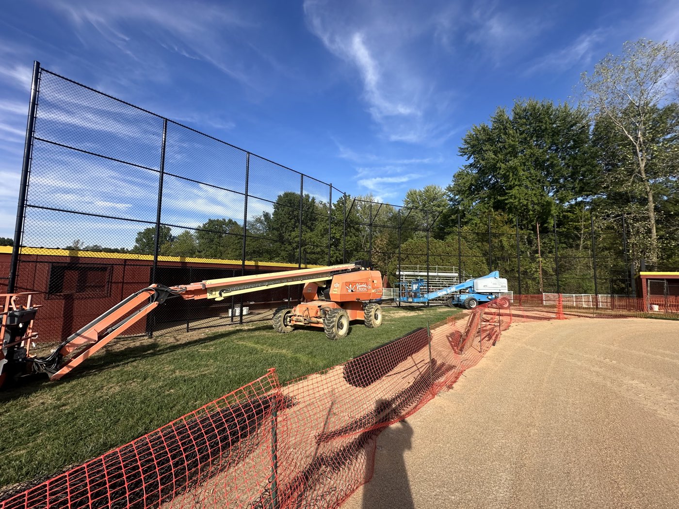 PFL Construction equipment working on an athletic field